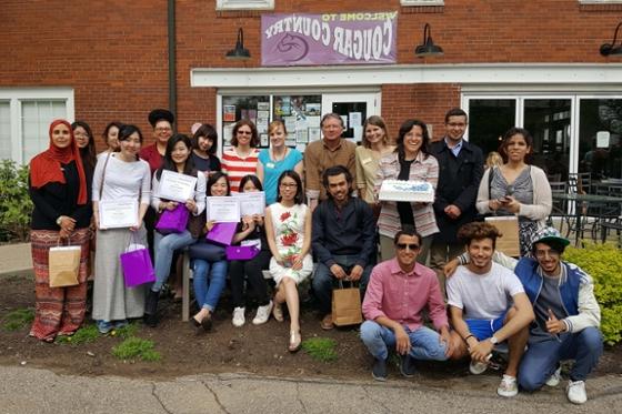 Photo of a group of international students on Chatham's campus smiling